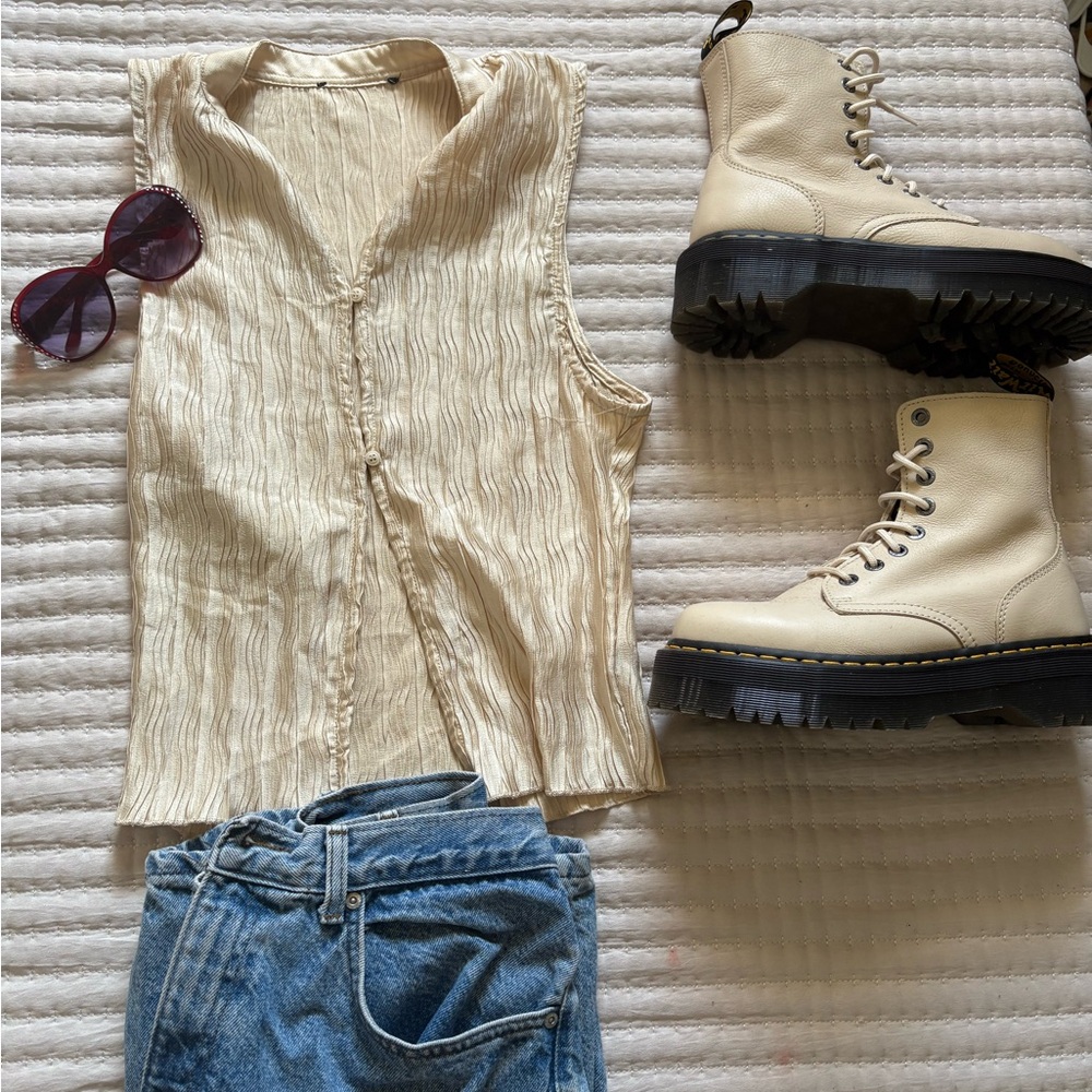 Cream Sleeveless Top and Boots with Blue Jeans